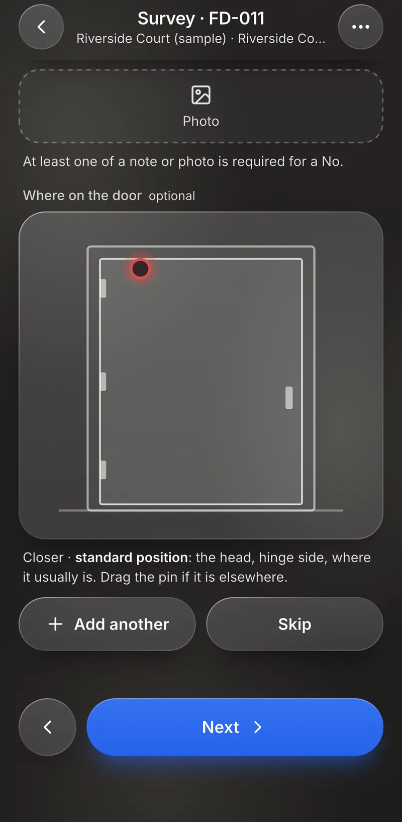 A fault on FD-011 pinned where it is on the door: the closer, at the head on the hinge side