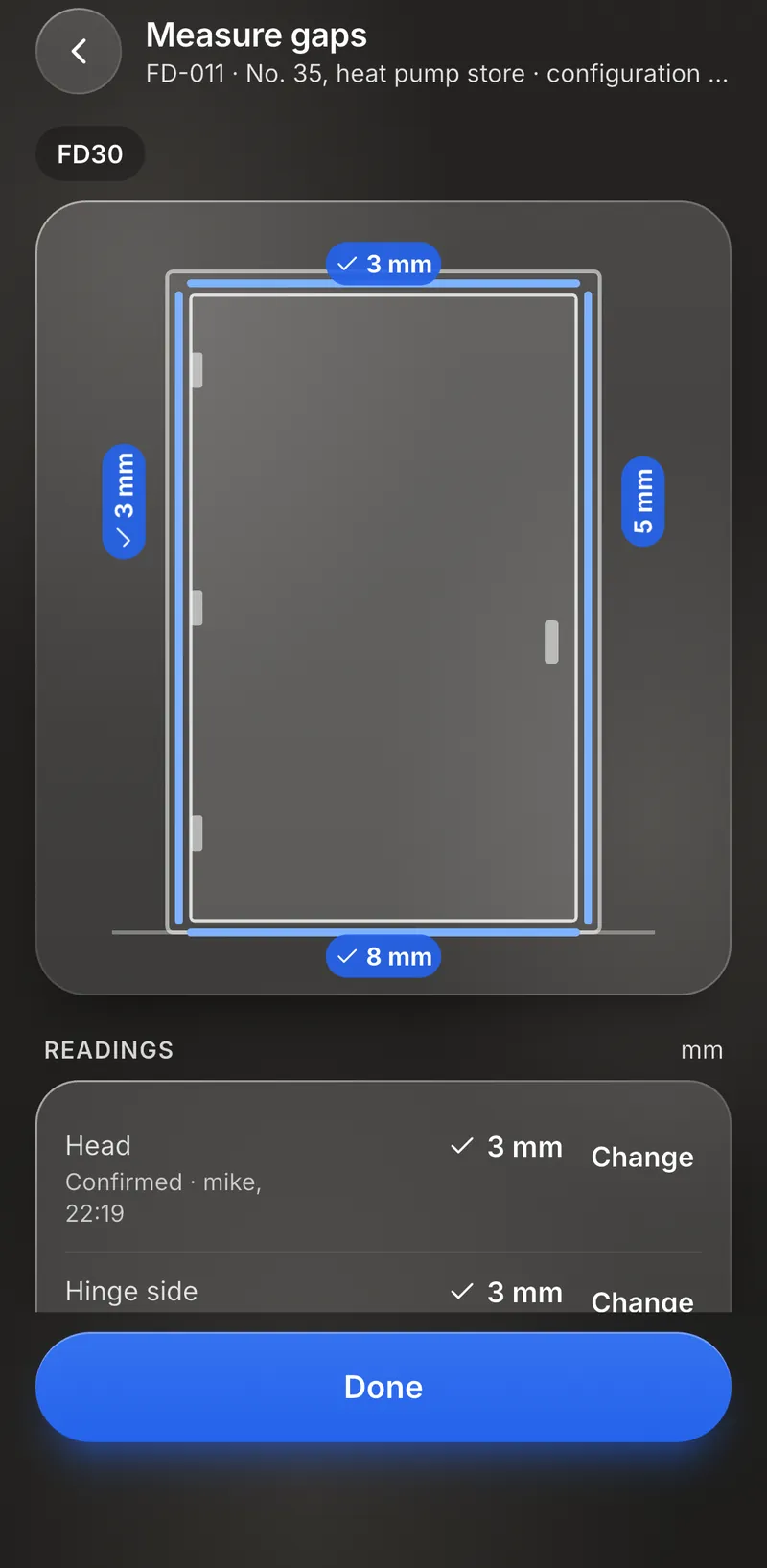 Measuring the gaps on FD-011: a drawing of the door with the head, both sides and the threshold read in millimetres, each confirmed